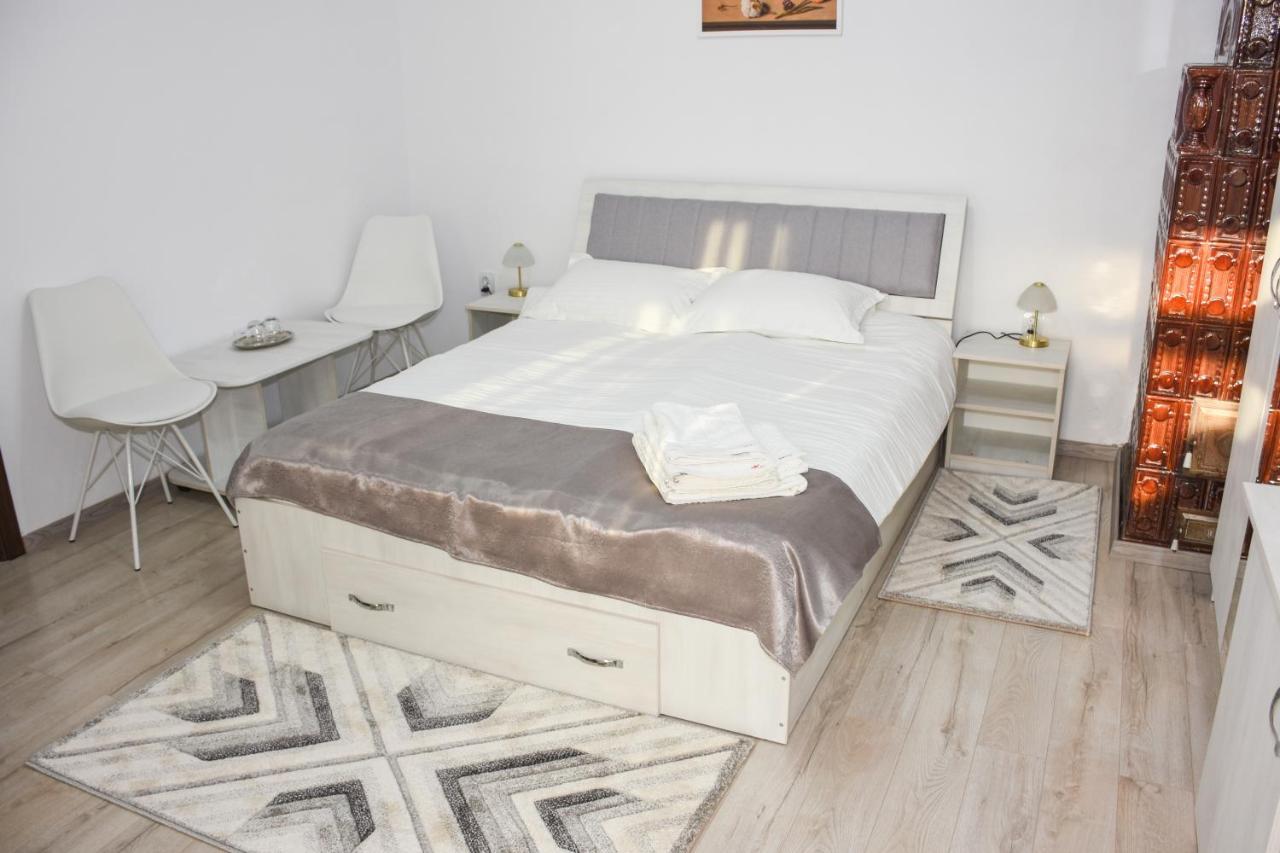 Tomis House Hotel Curtea de Argeş Buitenkant foto