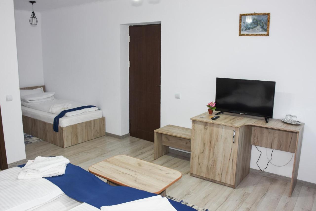 Tomis House Hotel Curtea de Argeş Buitenkant foto